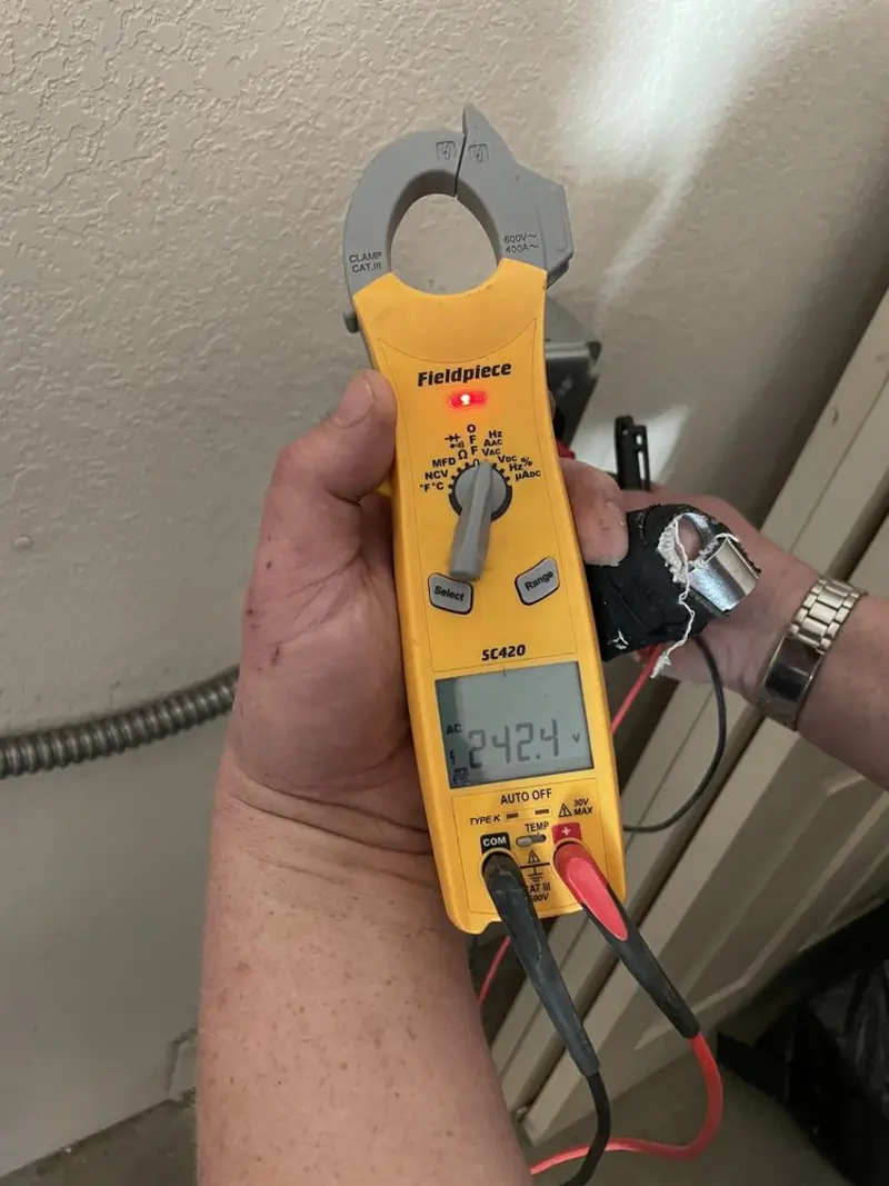 Voltage testing with clamp meter during Generator Installation in Avocado Heights